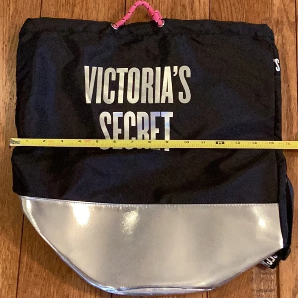 VICTORIA’S Secret black and silver backpack.